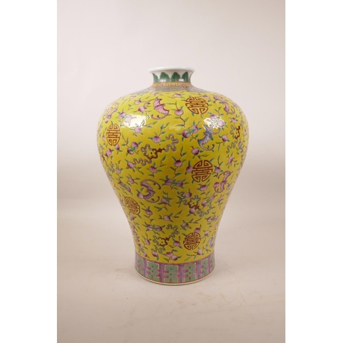 225 - A Chinese yellow ground porcelain meiping vase decorated with bats, peaches and auspicious symbols, ... 