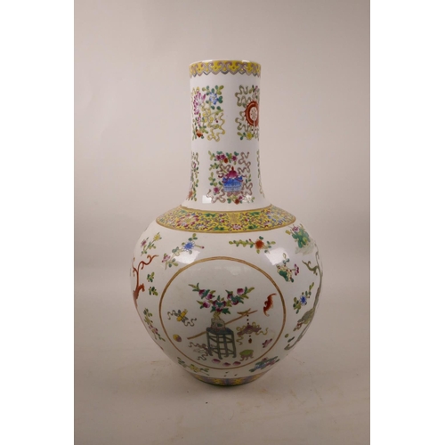 240 - A Chinese polychrome porcelain vase decorated with the Eight Buddhist Treasures to the neck and drag... 