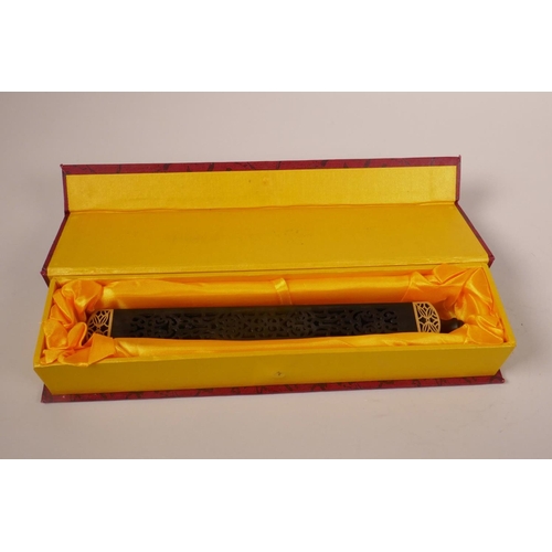 258 - A Chinese ebonised carved and pierced wood incense holder, cased, 8½