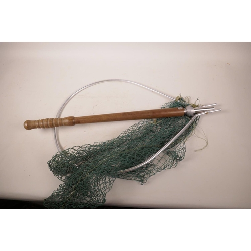 289 - A vintage folding landing net with turned wood handle and aluminium frame A/F, 38