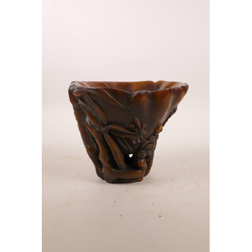 290 - A Chinese faux rhino horn libation cup with carved tree decoration, 5