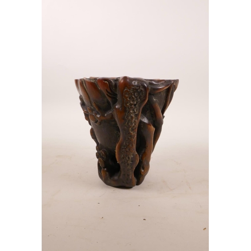 290 - A Chinese faux rhino horn libation cup with carved tree decoration, 5