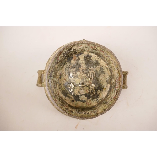 308 - A Chinese mixed metal censer with two handles, archaic style decoration and character inscriptions, ... 