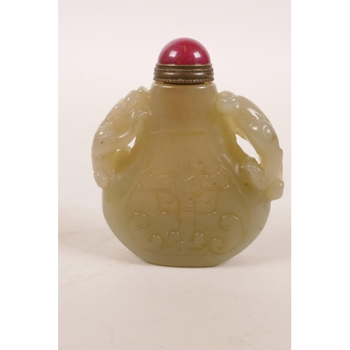 31 - A Chinese carved jade snuff bottle with two kylin handles, 2