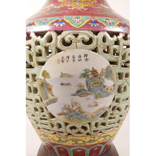 320 - A Chinese polychrome porcelain reticulated vase with decorative landscape panels to body and floral ... 