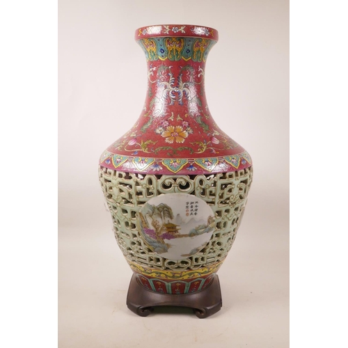 320 - A Chinese polychrome porcelain reticulated vase with decorative landscape panels to body and floral ... 