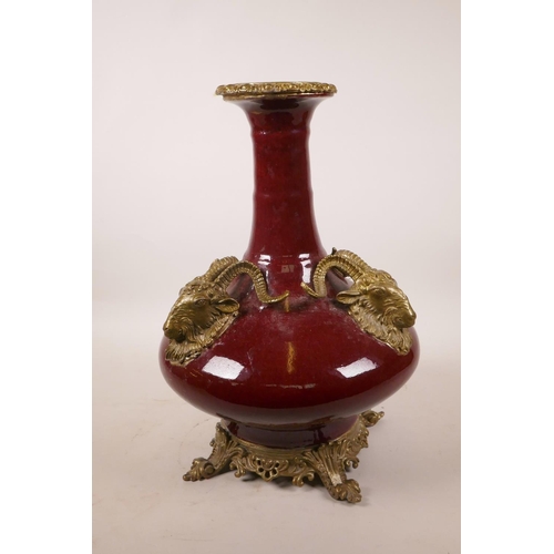 325 - A Chinese flambé glazed pottery vase with later applied ormolu style mounts, 4 character mark to bas... 