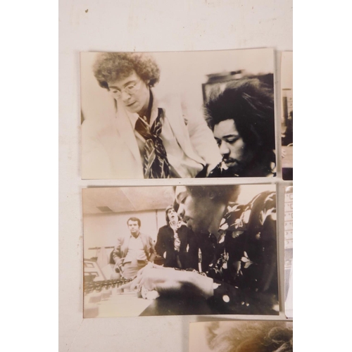 332 - A collection of five monochrome photographs of Jimi Hendrix, 5