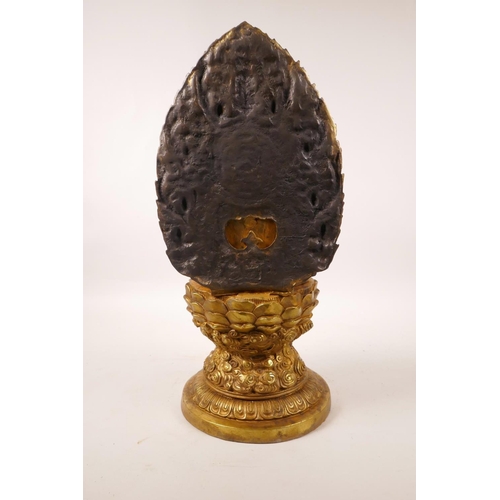 338 - A large Chinese gilt bronze of Buddha seated on a lotus throne, impressed 4 character mark to base, ... 