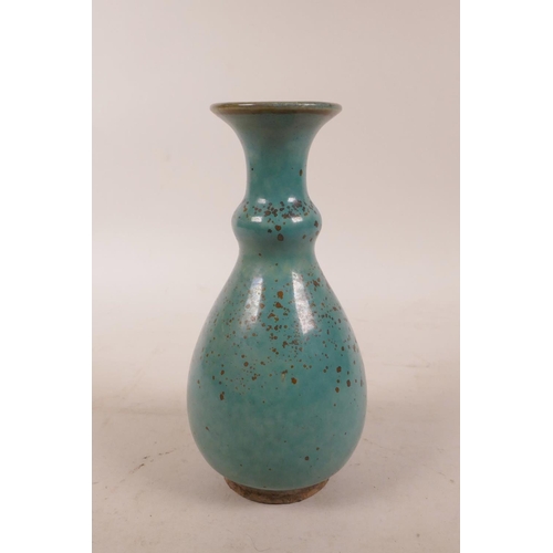 340 - A Chinese turquoise glazed pottery vase with speckle decoration to glaze, 5½