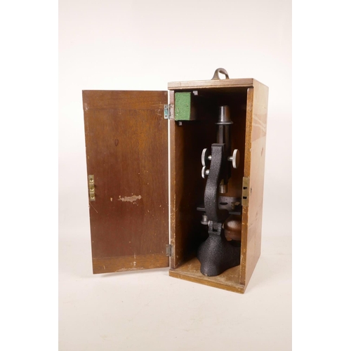 344 - A boxed scientific microscope by 'N&B 'Enbecco' Scientific Instruments', 14½