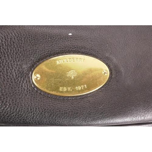 346 - A Mulberry black and brown leather handbag and branded bag protector, no.258668