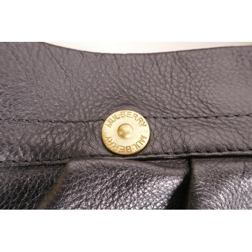 346 - A Mulberry black and brown leather handbag and branded bag protector, no.258668