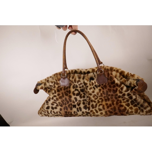 351 - A vintage leopardskin handbag and purse