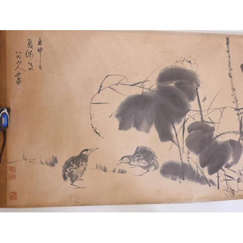 353 - A large Chinese watercolour scroll depicting birds amongst flowers, approximately 110