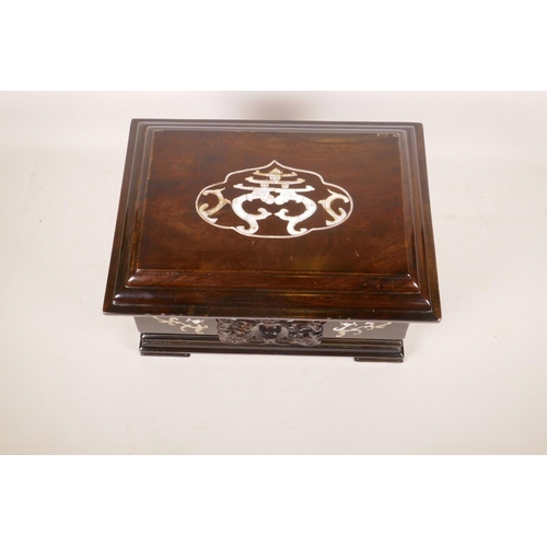 361 - A Chinese hardwood box with a sliding top and mother of pearl inlaid dragon decoration, 13