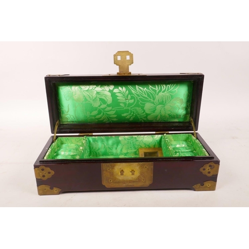 370 - A Chinese hardwood jewellery box with brass mounts and inset carved hardstone tablets, 10