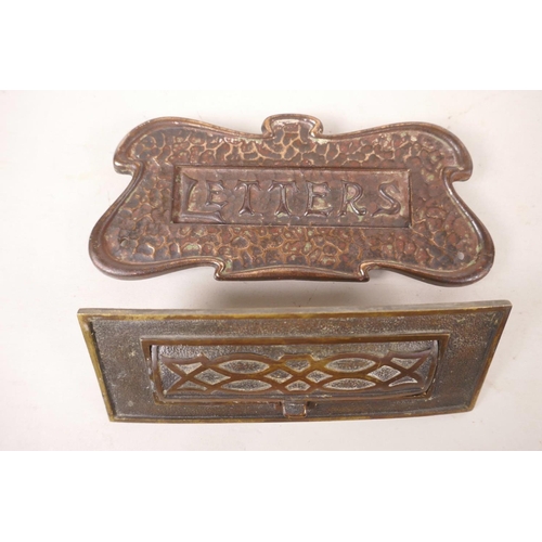 379 - An antique cast iron letterbox with coppered finish in the Art Nouveau style, and an early brass let... 