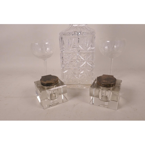 411 - Two Victorian square glass inkwells with hallmarked silver covers, 2¾