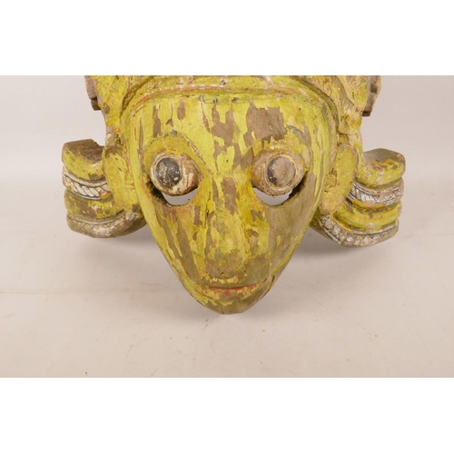 415 - A late C19th/early C20th Indian carved and painted ceremonial mask, 24½