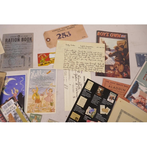 421 - A small collection of WWII replica memorabilia including copy magazines etc