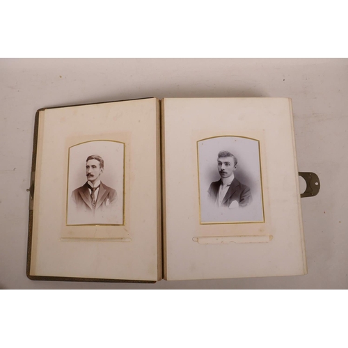 427 - A Victorian leather bound photograph album, 9