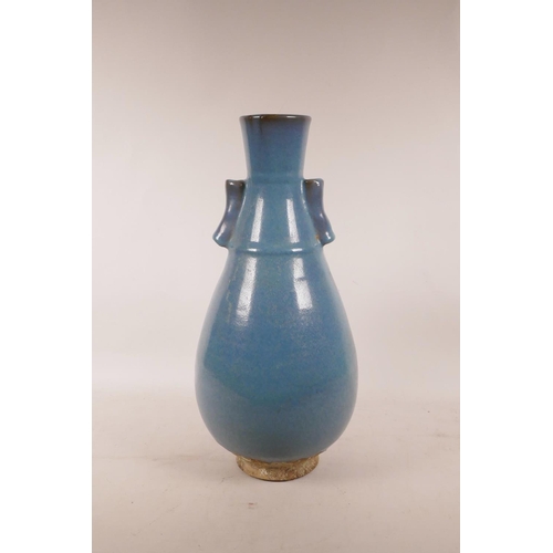 439 - A Chinese Jun kiln pottery vase with two lug handles, 15½