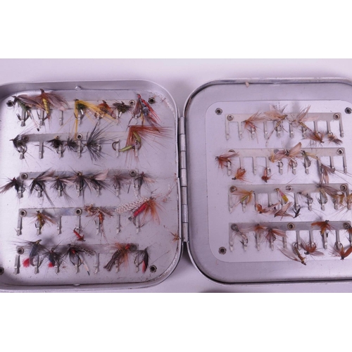 45 - Two vintage aluminium fishing fly boxes with flies, together with a third empty box