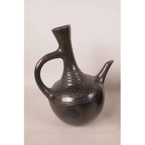 461 - A South African pottery ewer and a similar pot and cover, largest 9½