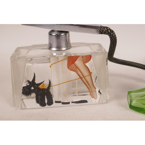 465 - An Art Deco clear glass perfume atomiser with painted enamel decoration of a romantic couple, 4¼