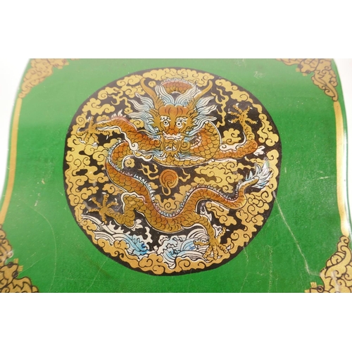 475 - A Chinese green lacquered vanity box with rising mirror and three drawers, with gilt and dragon deco... 