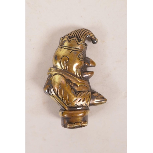 487 - A brass vesta case in the form of Mr. Punch