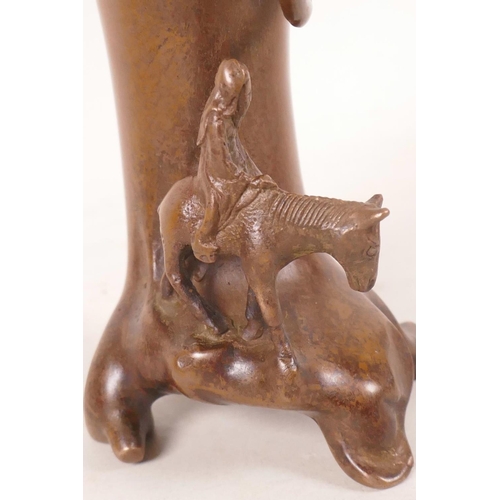 490 - An Oriental coppered bronze spill vase in the form of a tree with a sage mounted on a donkey, 6