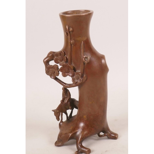 490 - An Oriental coppered bronze spill vase in the form of a tree with a sage mounted on a donkey, 6