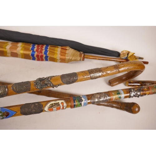 491 - Two mountain hiking sticks with many metal badges, 36