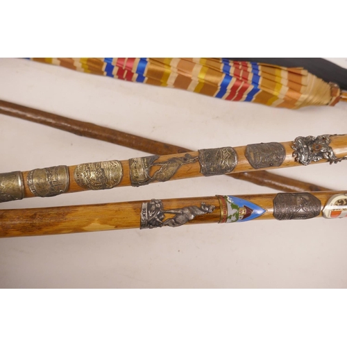 491 - Two mountain hiking sticks with many metal badges, 36