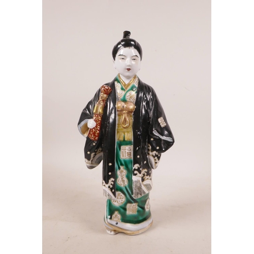 497 - A Japanese porcelain figure in a black robe, A/F repair, 10