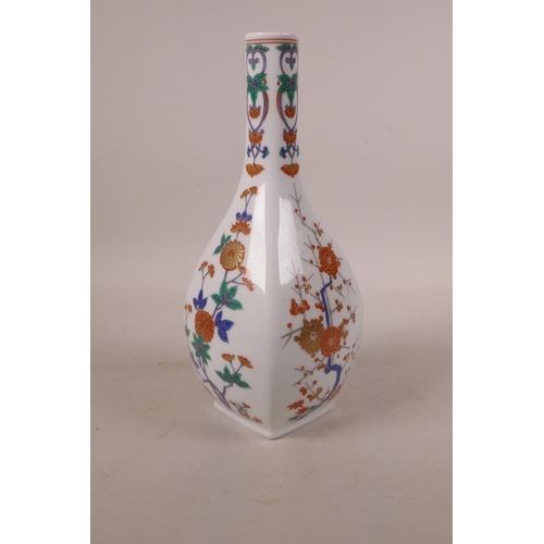 498 - A Japanese porcelain bottle vase with floral decoration, mark to base, 9½