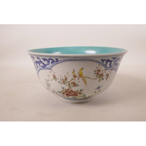 510 - A Chinese blue and white porcelain bowl with polychrome decorative panels depicting birds amongst fl... 