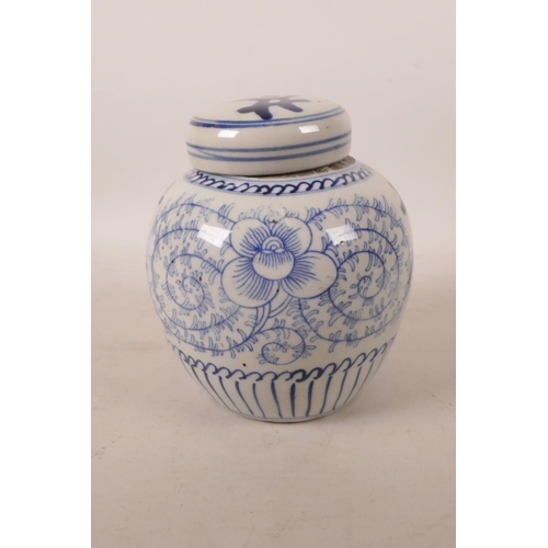 518 - A Chinese blue and white porcelain ginger jar and cover with scrolling floral and character decorati... 