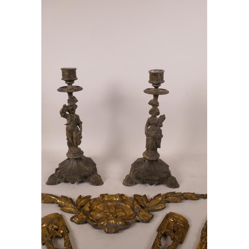 531 - A pair of French spelter figural candlesticks, together with five pieces of brass ormolu mounts, can... 