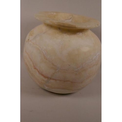 561 - An alabaster lamp jar, 10½