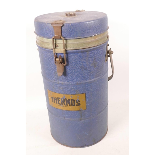 571 - A vintage thermos food container with three fitted aluminium food boxes, 7½