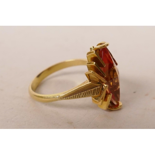 610 - A French gold (untested) Art Deco style ring set with an orange semi-precious stone, approximate siz... 