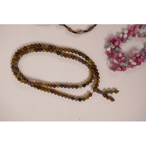 618 - A quantity of costume jewellery necklaces to include jade, agate, hardstone etc