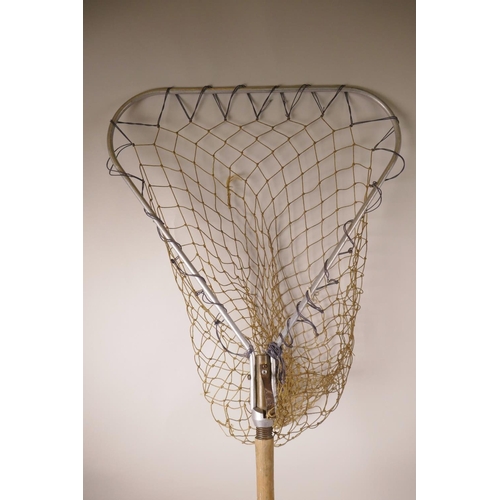 64 - A vintage wooden handled folding landing net with aluminium frame, 37