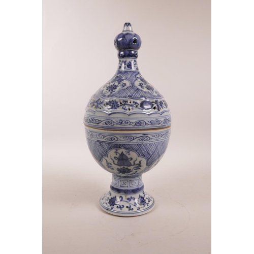 65 - A Chinese blue and white porcelain censer with a pierced cover and decorative floral panels, 6 chara... 