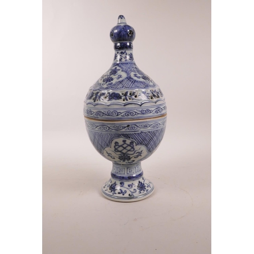 65 - A Chinese blue and white porcelain censer with a pierced cover and decorative floral panels, 6 chara... 