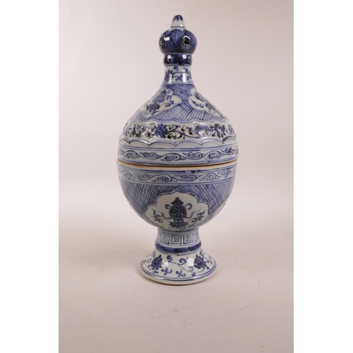 65 - A Chinese blue and white porcelain censer with a pierced cover and decorative floral panels, 6 chara... 