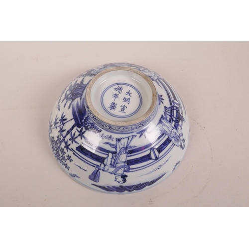 75 - A Chinese blue and white porcelain bowl decorated with figures in a garden, 6 character mark to base... 